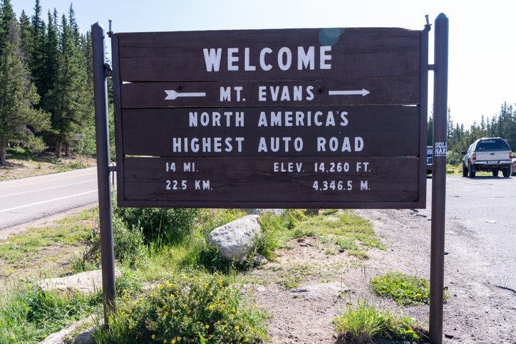 Welcome sign for the drive up Mt. Evans, the highest paved road in North America